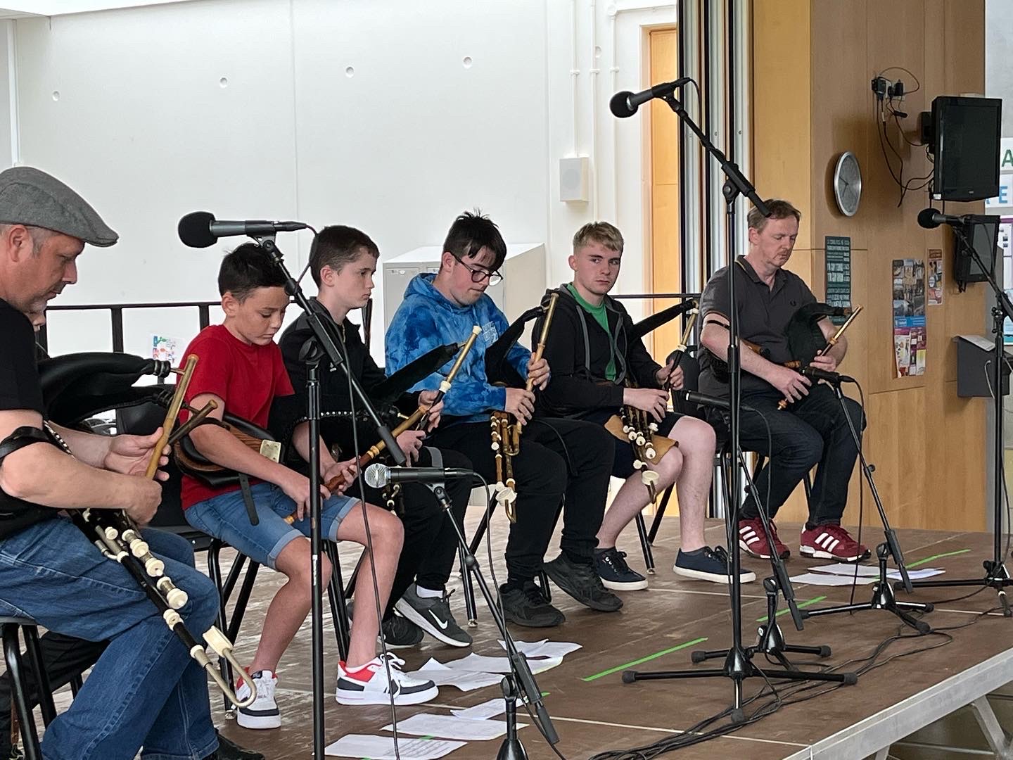 Milford Uilleann Pipe maker and tutor Martin Crossin with his class performing at the final concert of Ceol na Coille Summer School and Trad Camp ’02